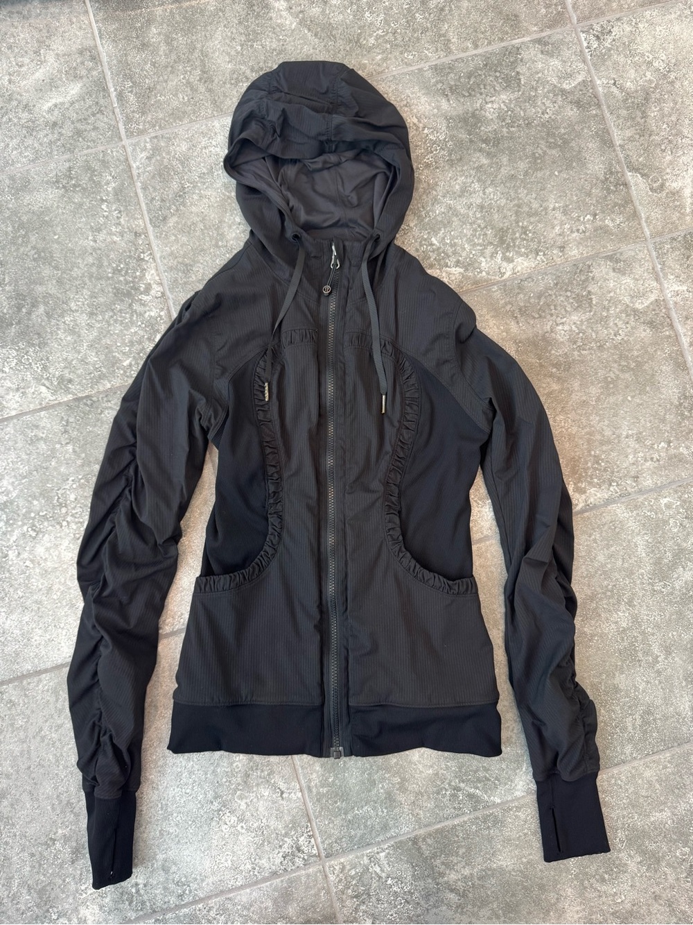 Lululemon reversible black jacket with ruffle details size 6 pre owned